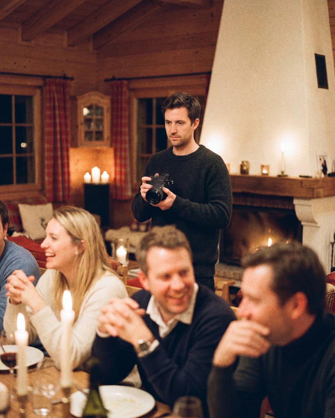 Photographer during a chalet dinner